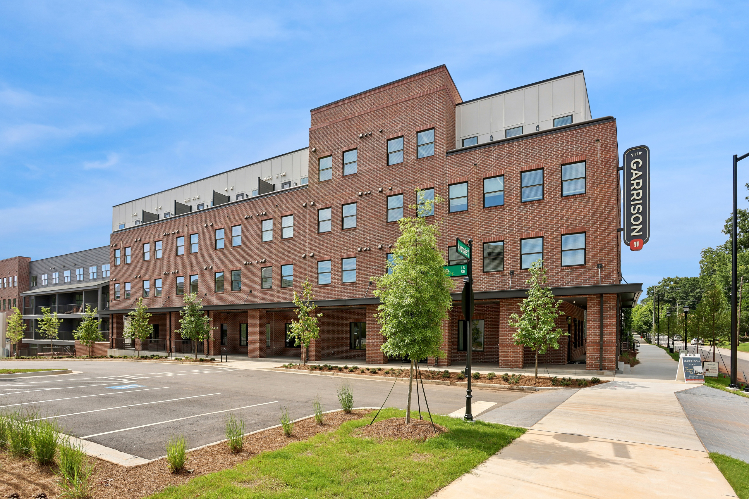 The Garrison apartment building and street frontage.