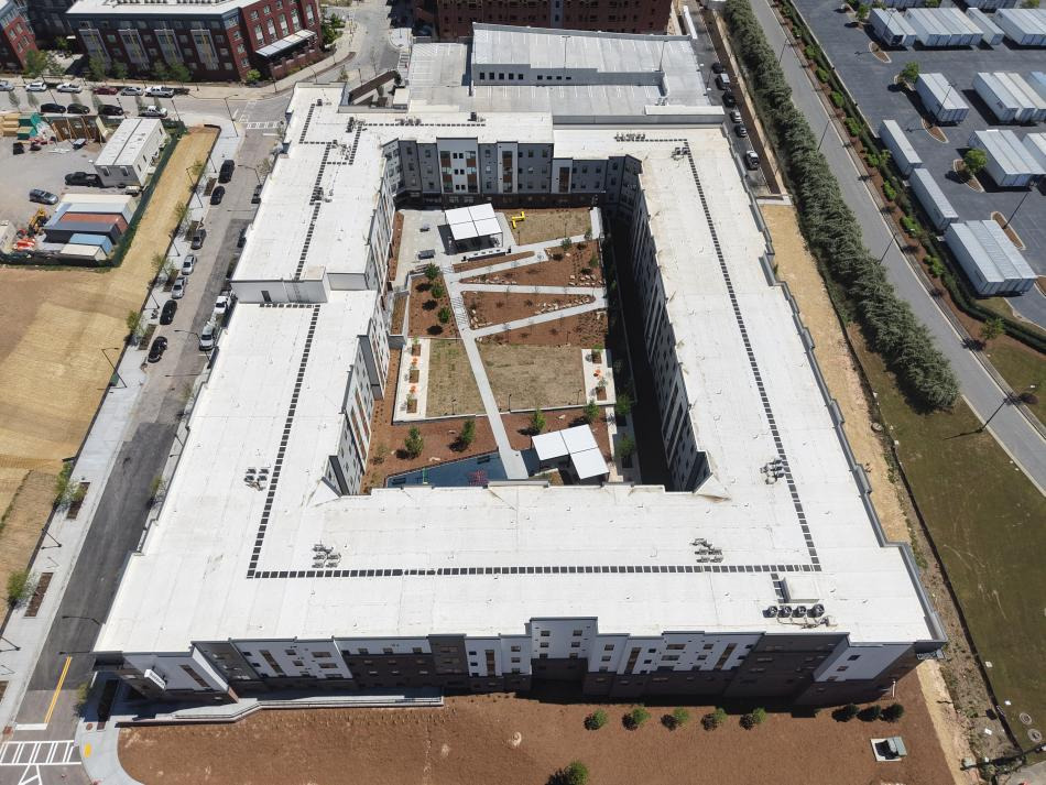 Aerial construction photograph of Legacy at Herndon Square and its courtyard.